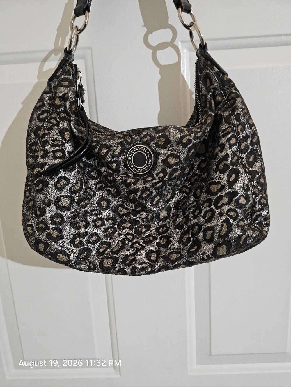 Discontinued Women's Black and Silver COACH Ocelet Hobo Bag F21063